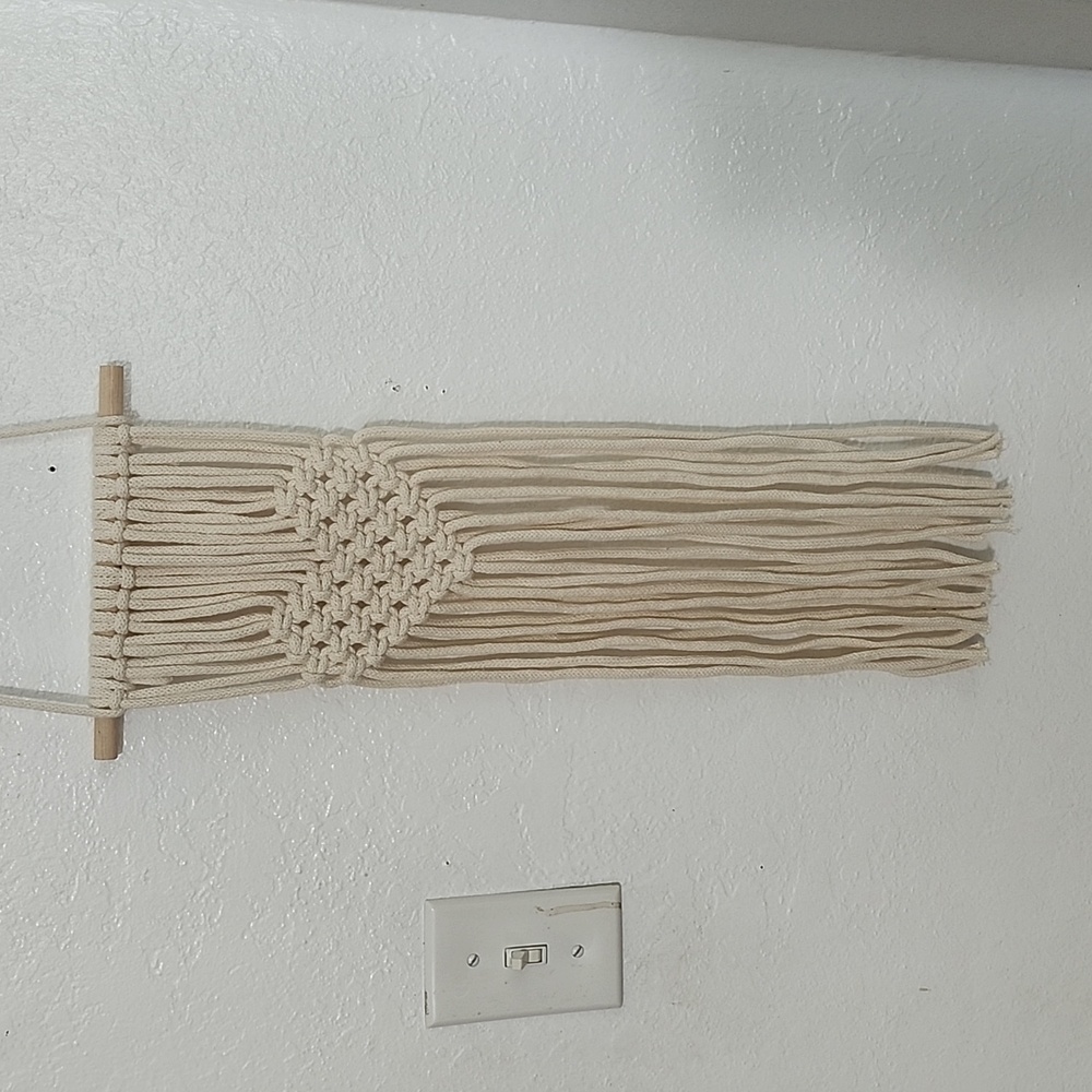 Macrame heart shaped wall hanging